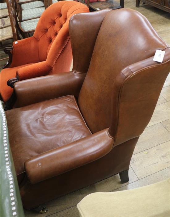 A wingback leather armchair